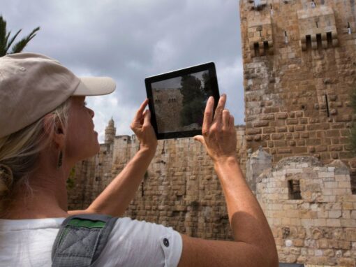 Woman taking picture with a tablet