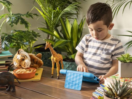 Very young child using his Echo Fire 7 Kids Edition tablet.