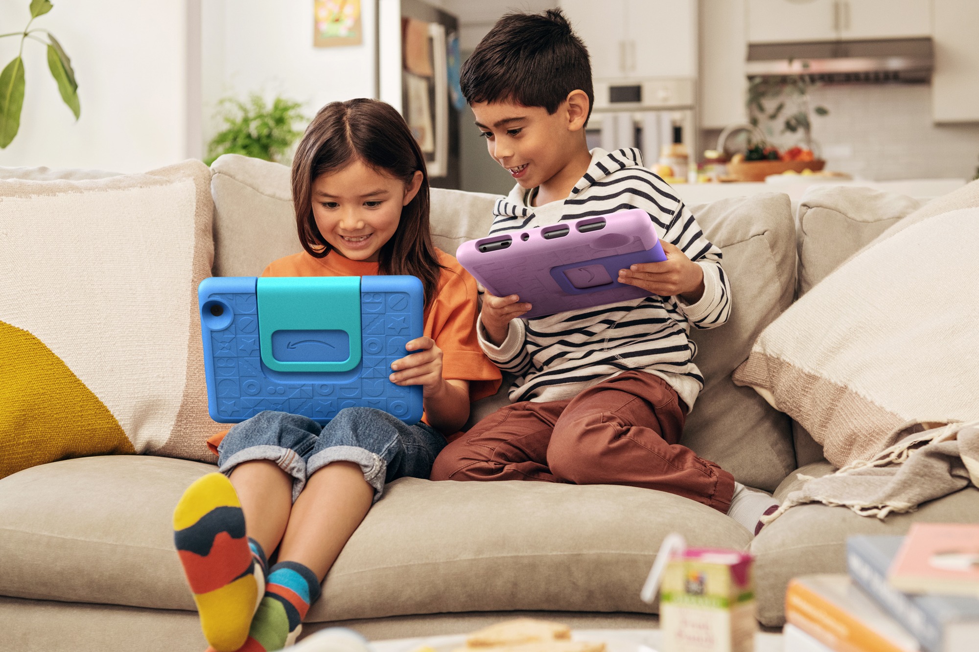Children reading stories using Amazon Kids