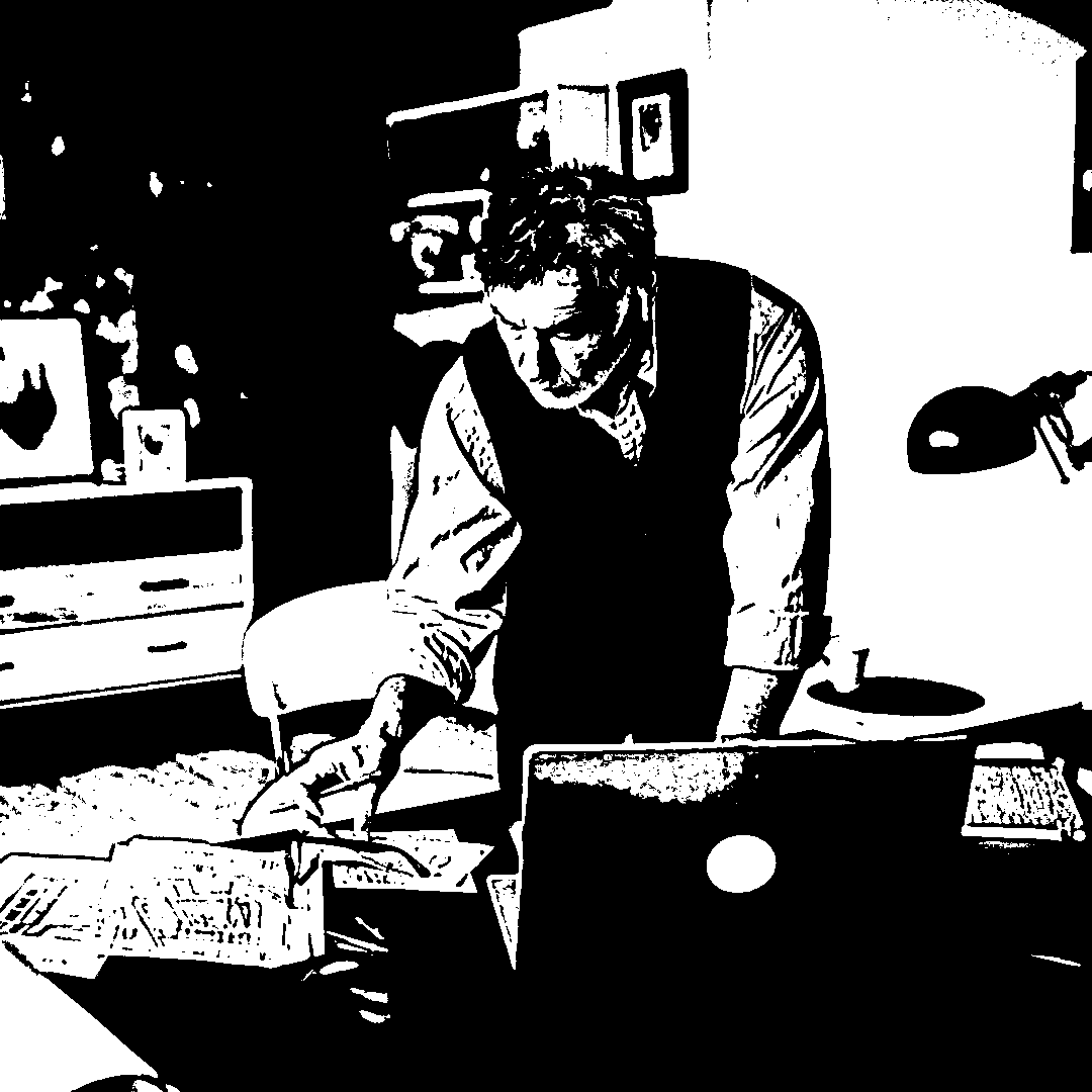 Designer's work desk setup symbolizing creativity and technology at QrocheHub.